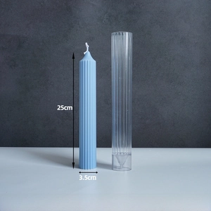 Detail of 25cm ribbed column candle mold with finished light blue paraffin wax candle