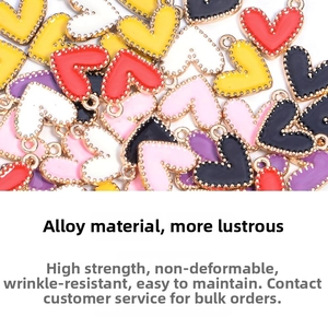 Detailed macro view of colorful enamel alloy heart pendants for DIY jewelry making