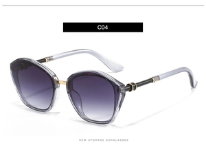 Detail of C04 oversized polygonal sunglasses with purple gradient lenses and metal trim
