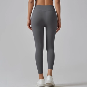 Rear view of high-waisted gray yoga pants showing seamless shaping and lift effect
