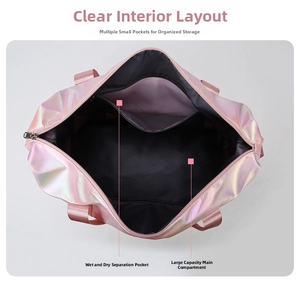 Internal view of pink travel bag showing waterproof wet-dry separation pocket and large capacity