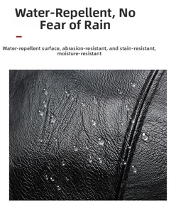 Close-up of waterproof black PU leather bag with durable lychee grain texture and droplets