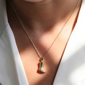 18k gold plated brass necklace featuring a detailed western cowboy boot pendant