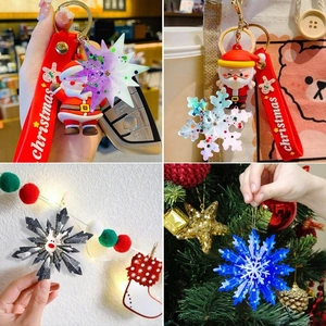 Christmas snowflake and Santa keychain pendants on a bag and tree for holiday decor