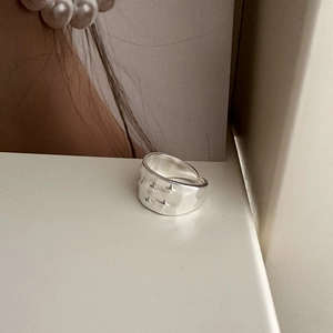 Minimalist S925 sterling silver wide band ring with embossed four-pointed star pattern