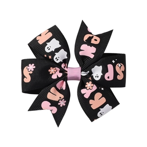 Halloween spooky bow hair clip with pink ghost and flower print on black grosgrain ribbon