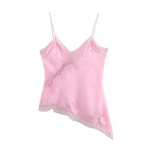 Detailed view of pink satin camisole with lace trim and asymmetrical hemline