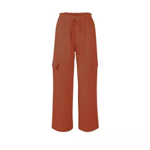 Detail view of cotton linen cargo pants with drawstring waist and large flap side pockets