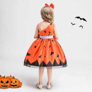 Detail back view of a one-shoulder orange pumpkin girl dress with bat and pumpkin graphics