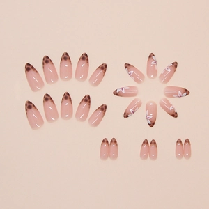 French almond fake nails with leopard print and white floral patterns in 24 piece set