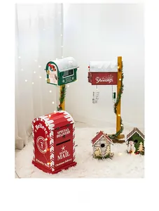 Classic red Christmas mailboxes with snowman motifs and festive Santa Mail lettering