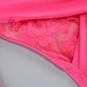 Detailed close-up of premium rose red lace stitching and pleated fabric texture