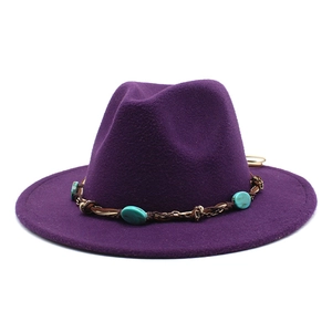 Close-up of purple wool fedora hat featuring bohemian turquoise stone hatband decoration