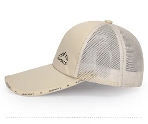 Detail of breathable mesh fabric and long brim with RSPORT text on the beige sports cap