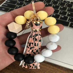 Silicone bead wristlet keychain with pink leopard tassel and marble pattern beads detail