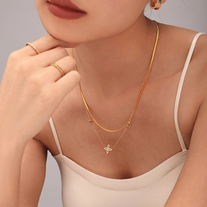 Golden double layered clover zircon necklace set with matching ring and hoop earrings