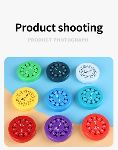 Top view of 9 colorful math fidget spinners showing addition and subtraction operations