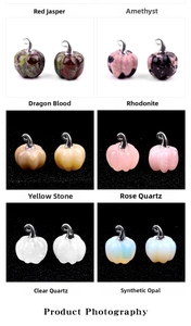 Detailed grid view of carved pumpkin gemstone pendants in various natural stones