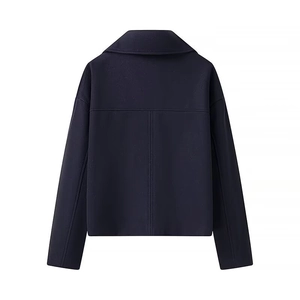 Rear view of short dark blue wool coat featuring clean vertical stitching and professional tailoring