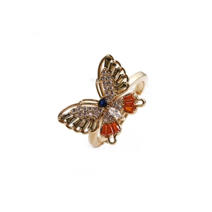 Bague ajustable en cuivre doré avec un papillon en zircon coloré et pierres bleues et orange