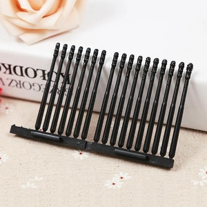 Classic black plastic hair comb clip for elegant bun styling with multi-tooth design