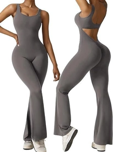 Detail of cross-back yoga jumpsuit with scrunch butt lifting and flared leg design