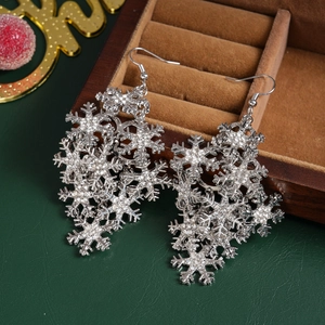 Elegant silver snowflake drop earrings with sparkling rhinestones in a luxury gift box