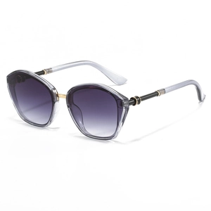Fashionable oversized gradient purple sunglasses with transparent grey frame and gold accents