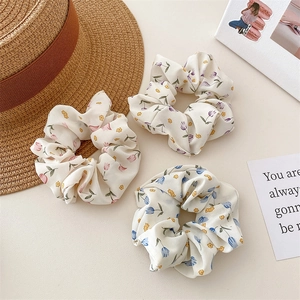 Floral chiffon scrunchies in pink, blue, and purple tulip patterns for high ponytail styles