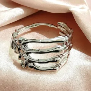 Gothic punk silver skeleton hand bracelet with adjustable skull bone structure