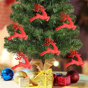 Set of 6 red glitter reindeer ornaments hanging on a Christmas tree branch