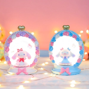 Detailed view of glowing Cinnamoroll night lights with floral frames and warm bokeh light
