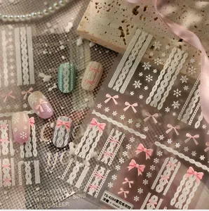 Detailed 3D embossed nail art stickers with knit patterns, bows and white snowflakes