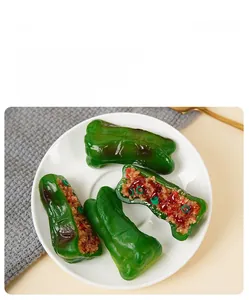 Macro detail of realistic PVC stuffed green pepper model with meat texture and seeds