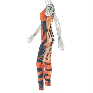 Side view of tiger print jumpsuit on transparent mannequin with sleek fitted cut