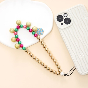 Christmas phone charm with gold bells, snowflake pendant and colorful festive beads