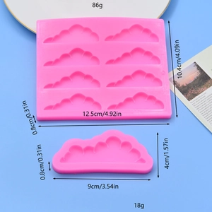 Pink silicone cloud molds for DIY cake decorating and chocolate baking projects