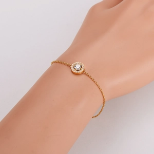 Elegante bracciale in acciaio inossidabile dorato con ciondolo tondo in zircone