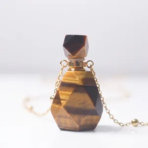 Tiger eye stone perfume bottle pendant necklace with gold plated chain and crystal finish