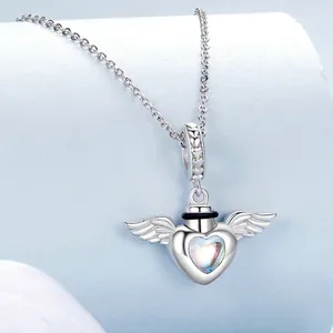 S925 sterling silver heart-shaped pendant with wings and sparkling center charm