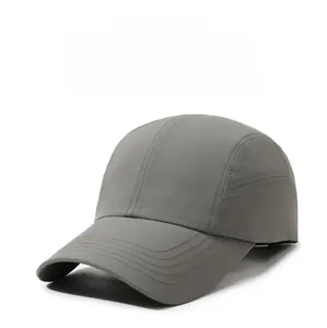 Close-up of charcoal grey quick-dry baseball cap featuring reinforced stitching and breathable fabric