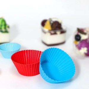 Close-up of red and blue silicone muffin cups with round fluted edges for baking