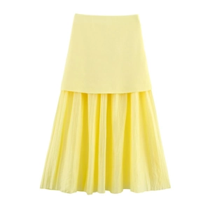 Detail of a bright yellow pleated midi skirt with seamless waist and flowing design