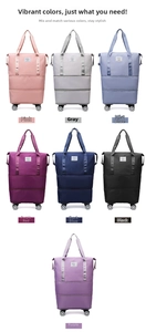 Detail view of multi-color waterproof travel bags with smooth rolling swivel wheels