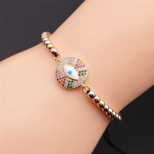 Adjustable evil eye beaded bracelet with colorful cubic zirconia and multi-tone metal beads