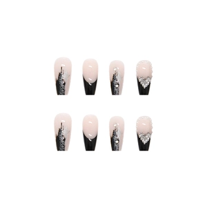 Handmade press-on nails featuring black French tips, silver glitter, and pearl hearts