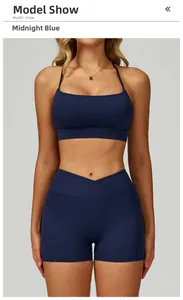 Detail of midnight blue yoga set with V-cross high waist shorts and side pockets