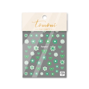 Detail of 5D embossed nail stickers featuring green and white floral and bow designs