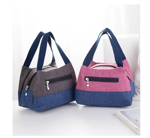 Dual-color portable lunch bag with reinforced blue handles and durable oxford fabric
