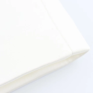 Detailed close-up of premium white satin fabric with smooth texture and fine stitching